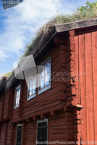 Image of Timber framed red house