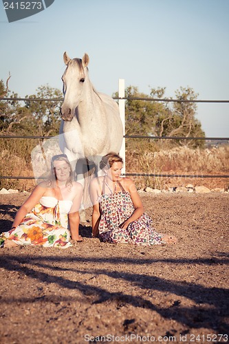 Image of two woman horse and dog outdoor in summer happy