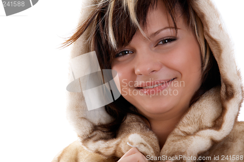 Image of Girl in fur coat on white background