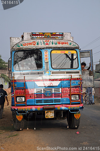 Image of Typical, colorful, decorated public transportation bus in Kumrokhali, West Bengal, India