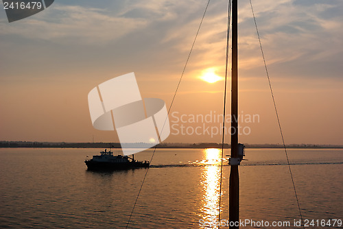 Image of Summer sunset seen from the prow of a cruise liner