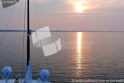 Image of Summer sunset seen from the prow of a cruise liner