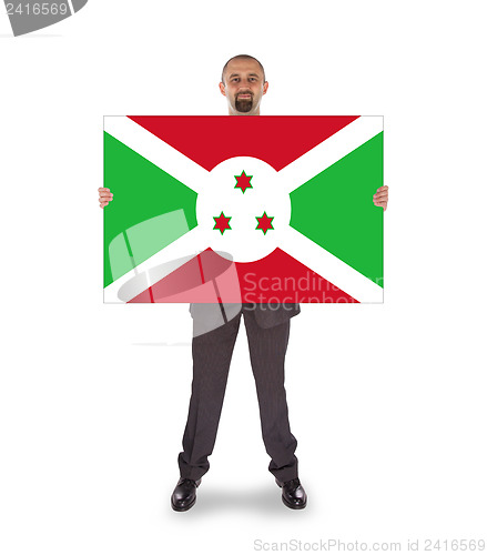Image of Businessman holding a big card, flag of Burundi