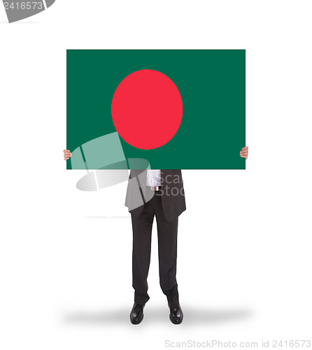 Image of Businessman holding a big card, flag of Bangladesh