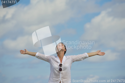 Image of happy woman enjoy  summer time