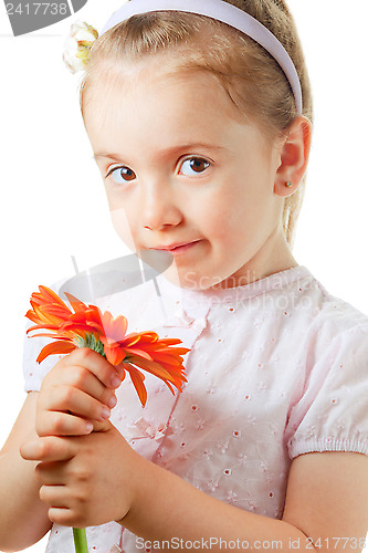 Image of Pretty little girl with flower