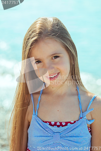 Image of Beautiful little girl near the sea