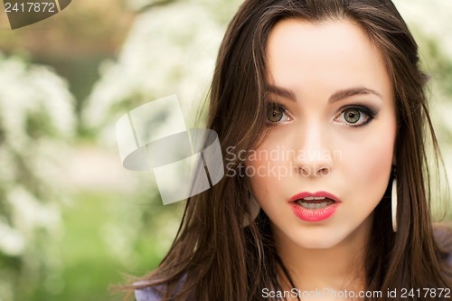 Image of Young pretty brunette