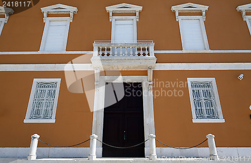 Image of Facade, wooden door and symmetrical windows. Zadar, Croatia