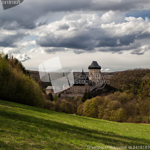 Image of Karlstejn castle in the forest