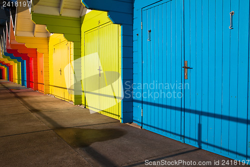 Image of Beach huts at sunrise