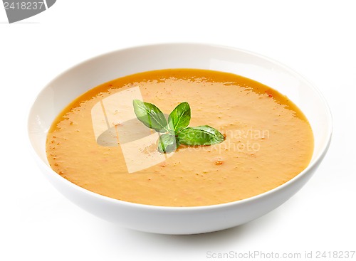 Image of bowl of squash soup with basil