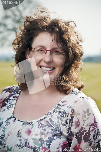 Image of Laughing brunette woman