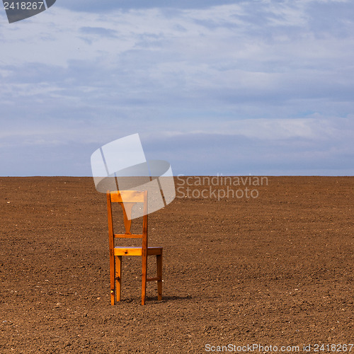 Image of The chair on the field