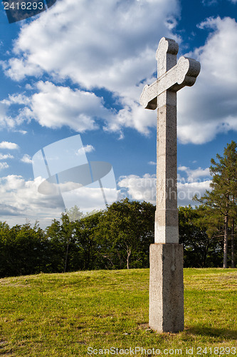 Image of The stone cross at sunset