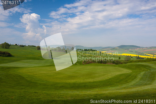 Image of On the golf course on the hills