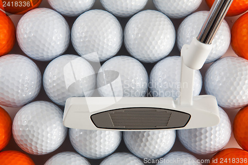 Image of Golf putter and balls