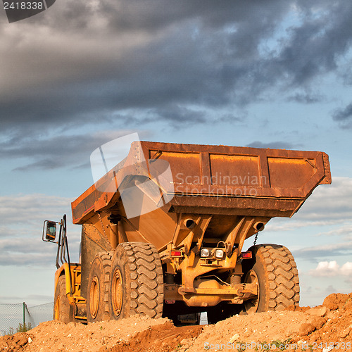 Image of Heavy truck at sunset