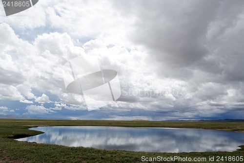 Image of Landscape of lake and clouds in Tibet