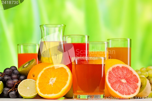 Image of glasses of juice, fruits