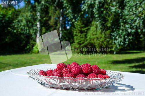 Image of Raspberries in a glass bowl