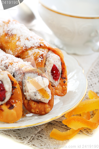 Image of Cannoli and candied oranges. 