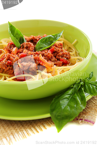 Image of Spaghetti with meat, tomato and basil.