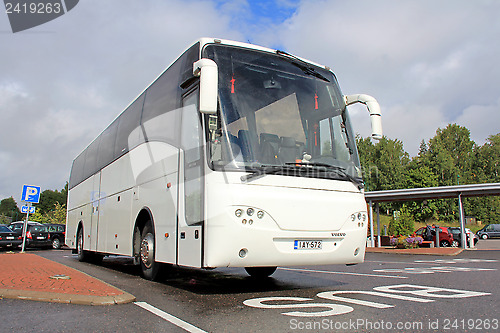 Image of Modern Volvo Coach Bus Waiting for Passengers