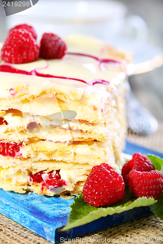 Image of Puff pastry with cream and raspberries.