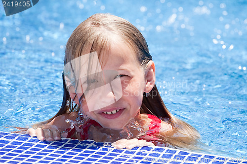 Image of little girl in swimming pool