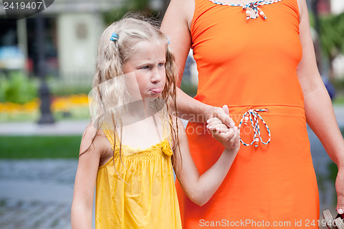 Image of funny wet offended little girl