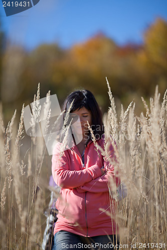 Image of Woman on autumn meadow