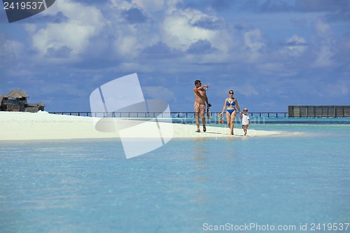 Image of happy family on vacation