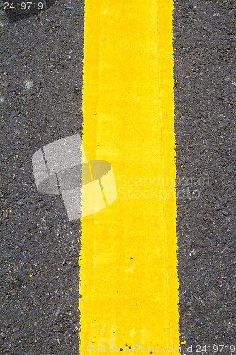 Image of yellow line on the road texture background