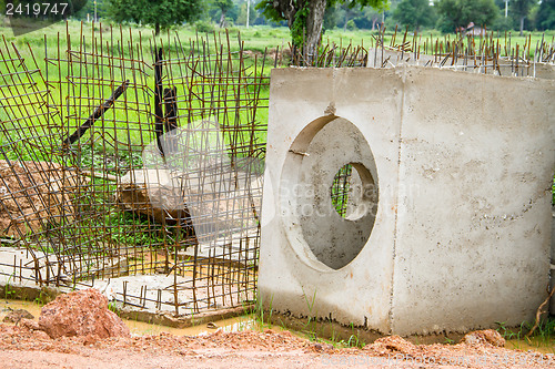 Image of Concrete drainage pipes on construction site