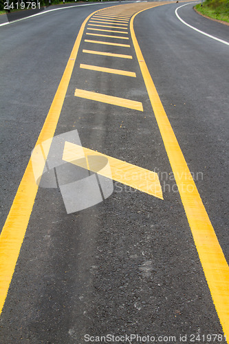 Image of yellow line on the road texture background