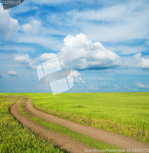 Image of rural road under low clouds
