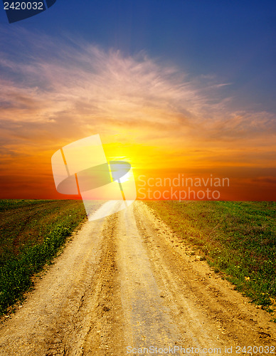 Image of sunset over rural road