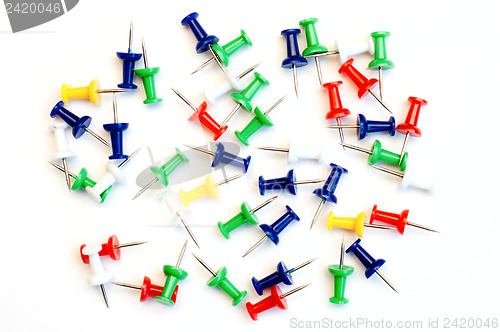 Image of multicolor paper clips over white