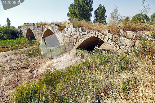 Image of Roman bridge over the river Brulles Trisla in Sasamon