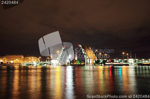 Image of open drawbridge at night in St. Petersburg