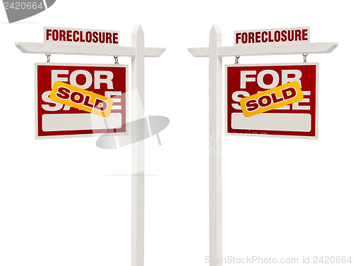 Image of Two Foreclosure Sold For Sale Real Estate Signs, Clipping Path