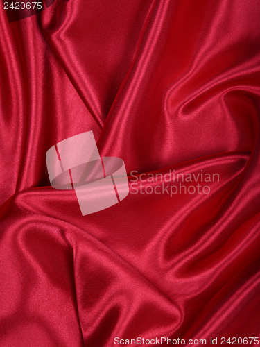 Image of Smooth elegant red silk as background 