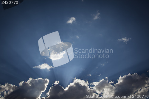 Image of Silver Lined Storm Clouds with Light Rays and Copy Space