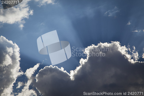 Image of Silver Lined Storm Clouds with Light Rays and Copy Space