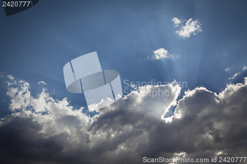 Image of Silver Lined Storm Clouds with Light Rays and Copy Space