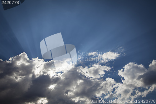 Image of Silver Lined Storm Clouds with Light Rays and Copy Space