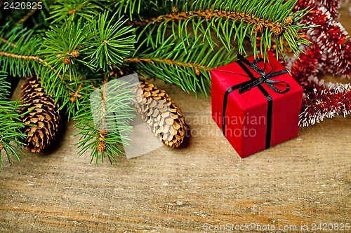 Image of christmas fir tree with pinecones and decorations