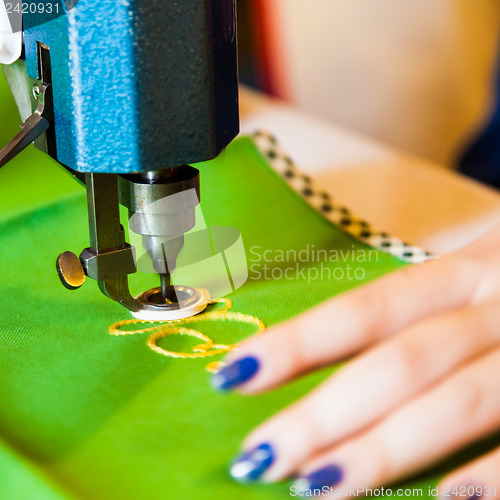 Image of Lady hand at sewing