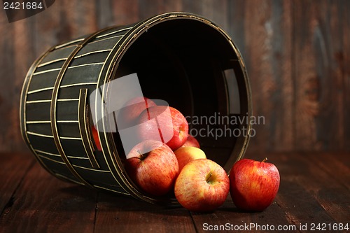 Image of Barrel Full of Red Apples on Wood Grunge  Background